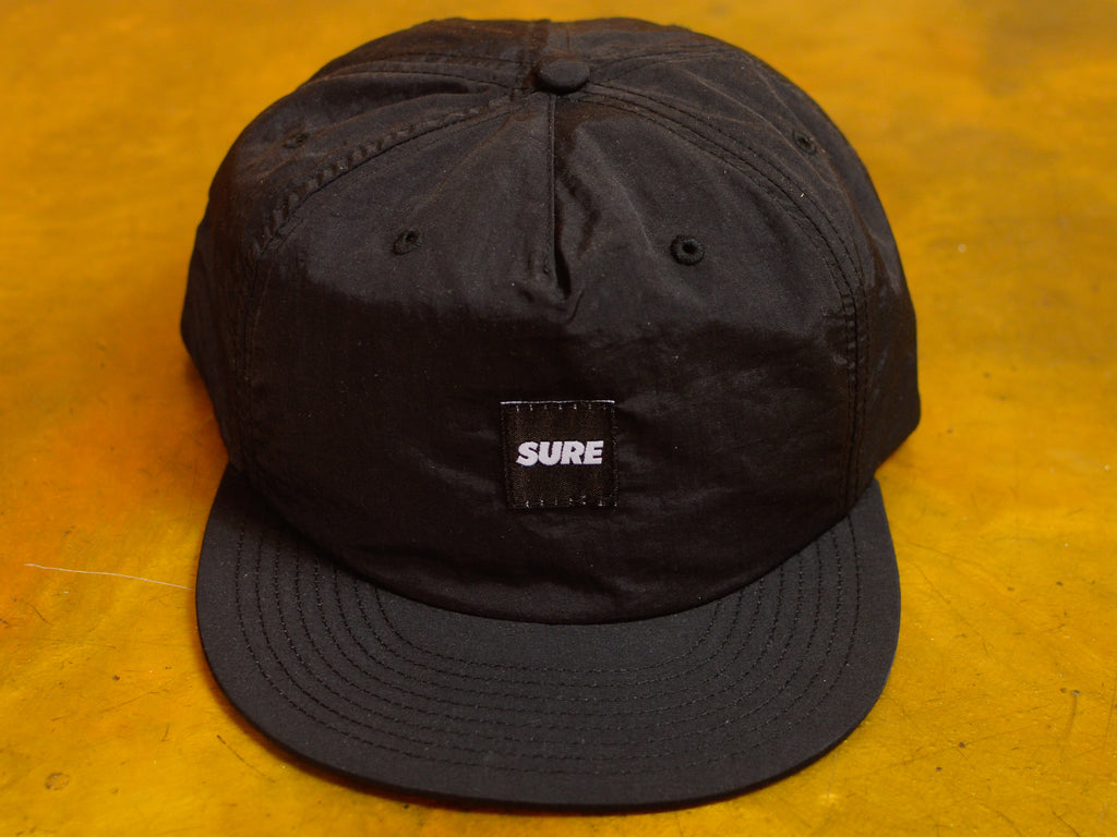Banner Label Nylon Snapback Cap - Black