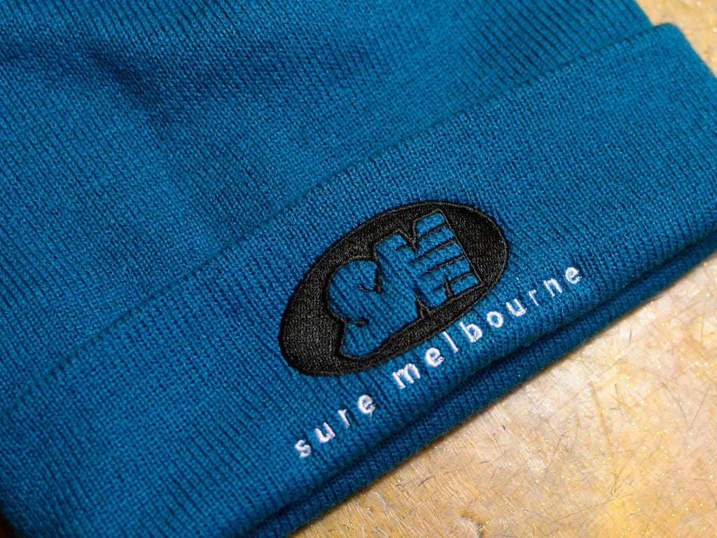 SM Oval Embroidered Cuff Beanie - Atlantic / Black